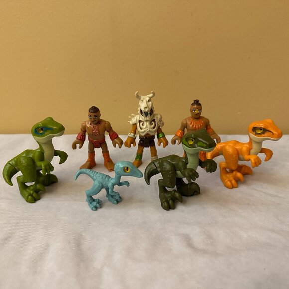7 Imaginext Figures / 3 Tribal Warriors and 4 Jurassic World Raptors - Picture 1 of 12